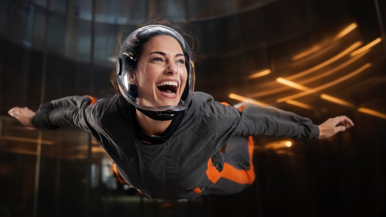 Indoor Skydiving — Illustrative Image Flying Girl